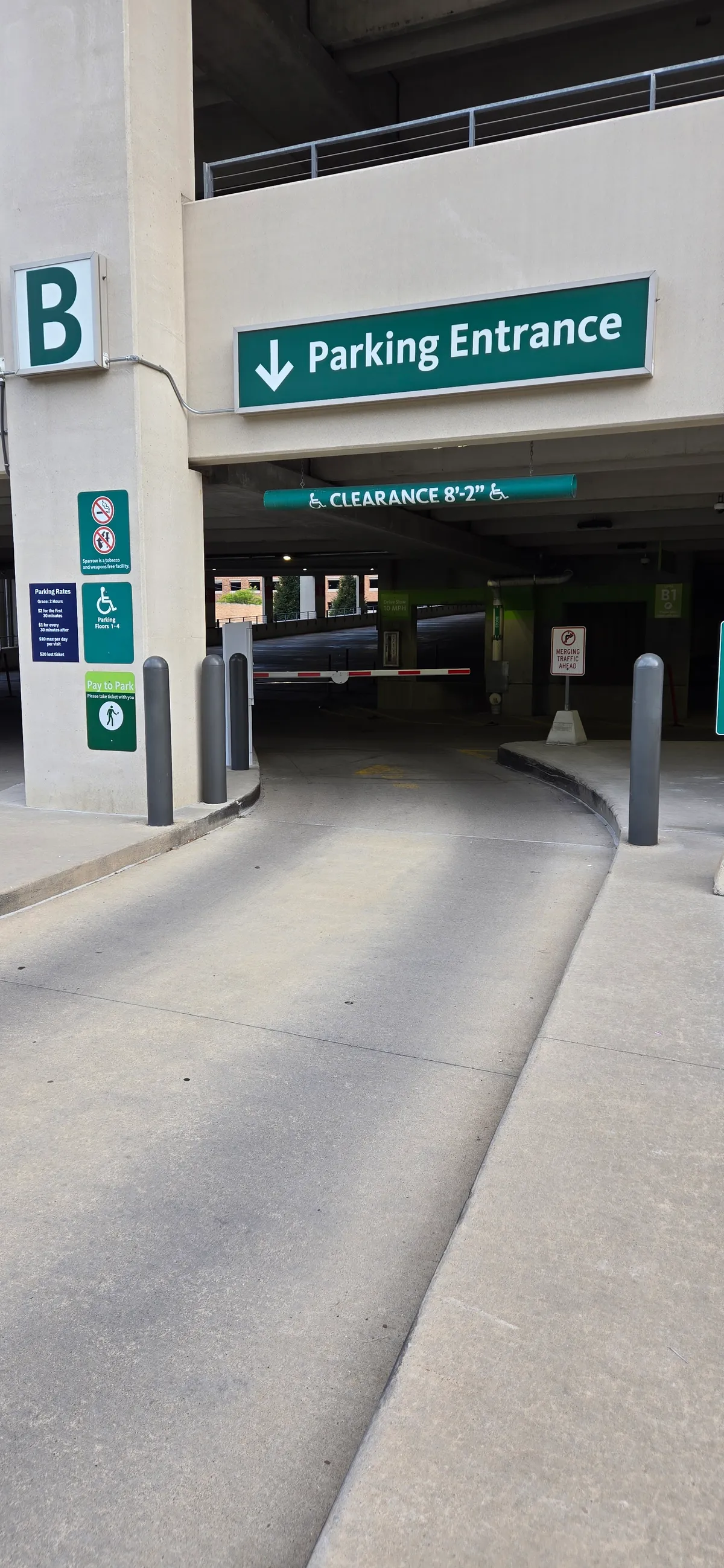 parking garage entrance with ticket machine