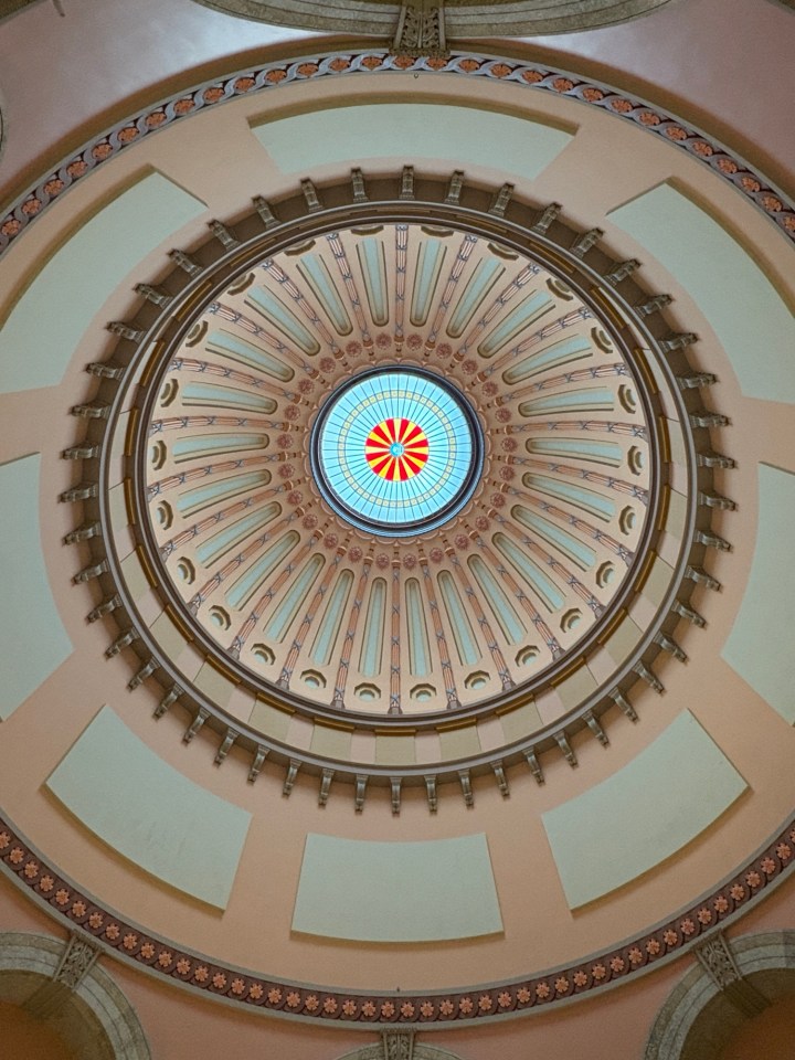 Ohio Statehouse rotunda interior with visitors