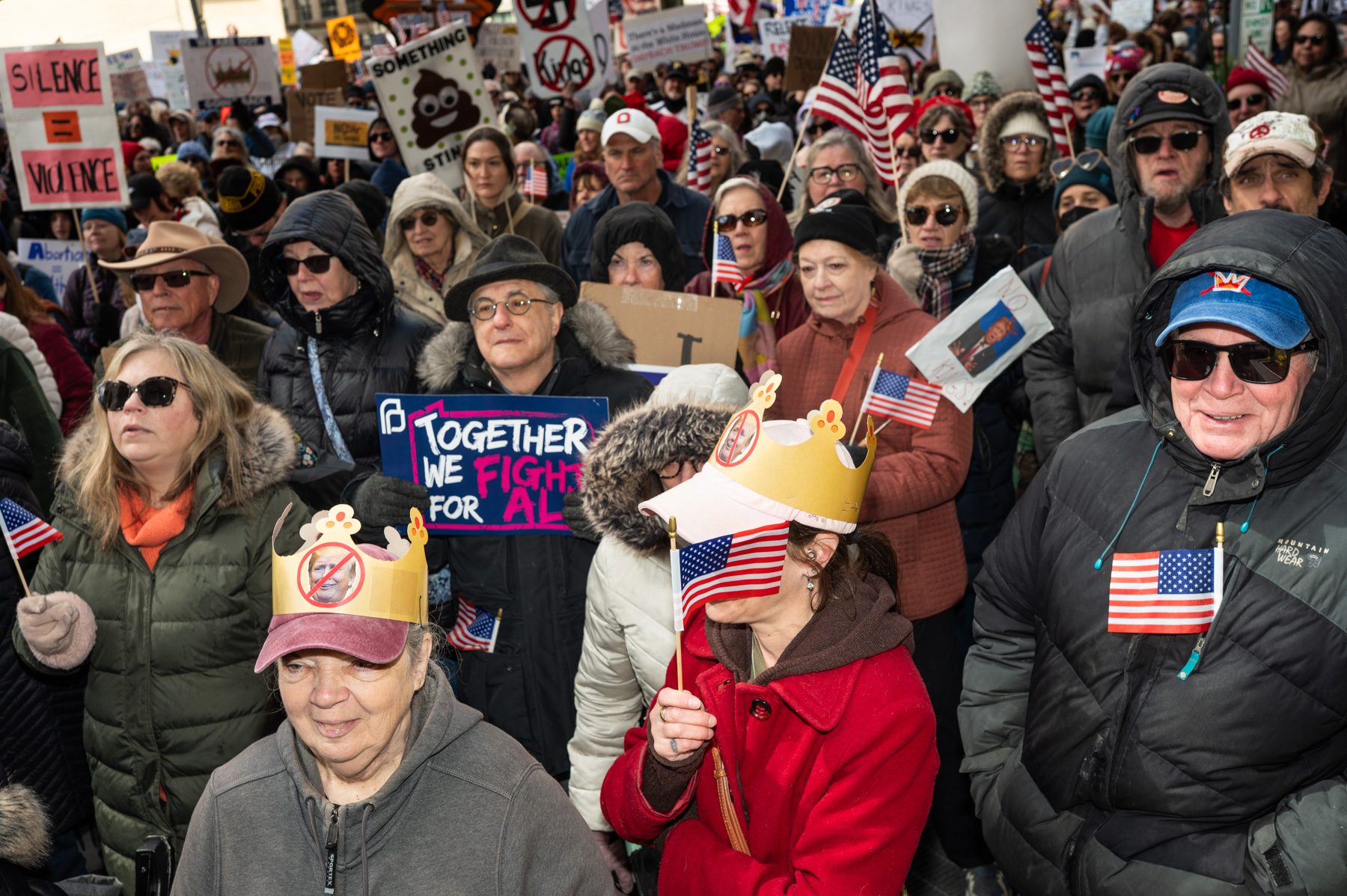 outdoor political rally crowd with signs in Ohio
