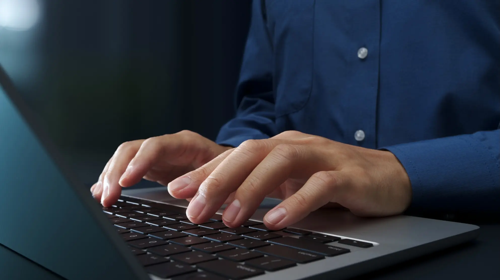 laptop screen with a news article draft